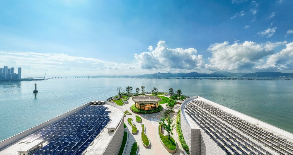 a large building with a large pool and a large building with a large building and a large building with a large building and a large building with a large building and a large building with a large building description automatically generated with medium confidence